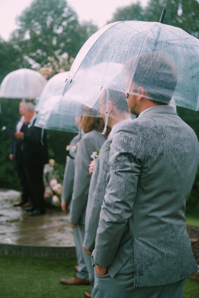 A rainy Spring wedding ceremony captured by Tags Photography at Meadows at Mossy Creek